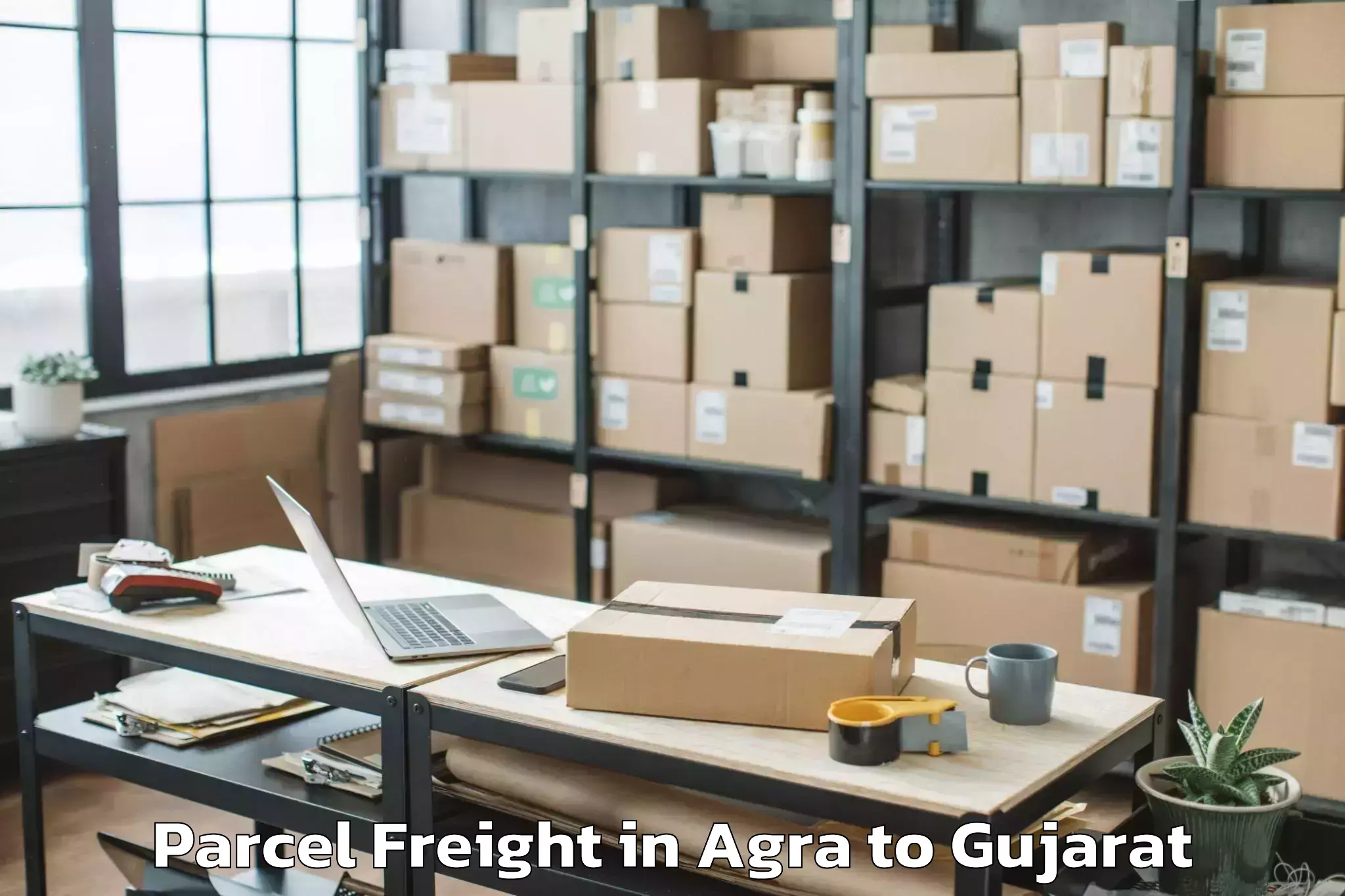 Book Agra to Vanthali Parcel Freight Online